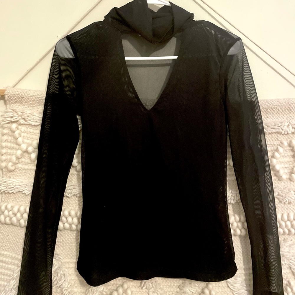Sheer black long sleeve turtleneck. Charlotte Russe Size Small.